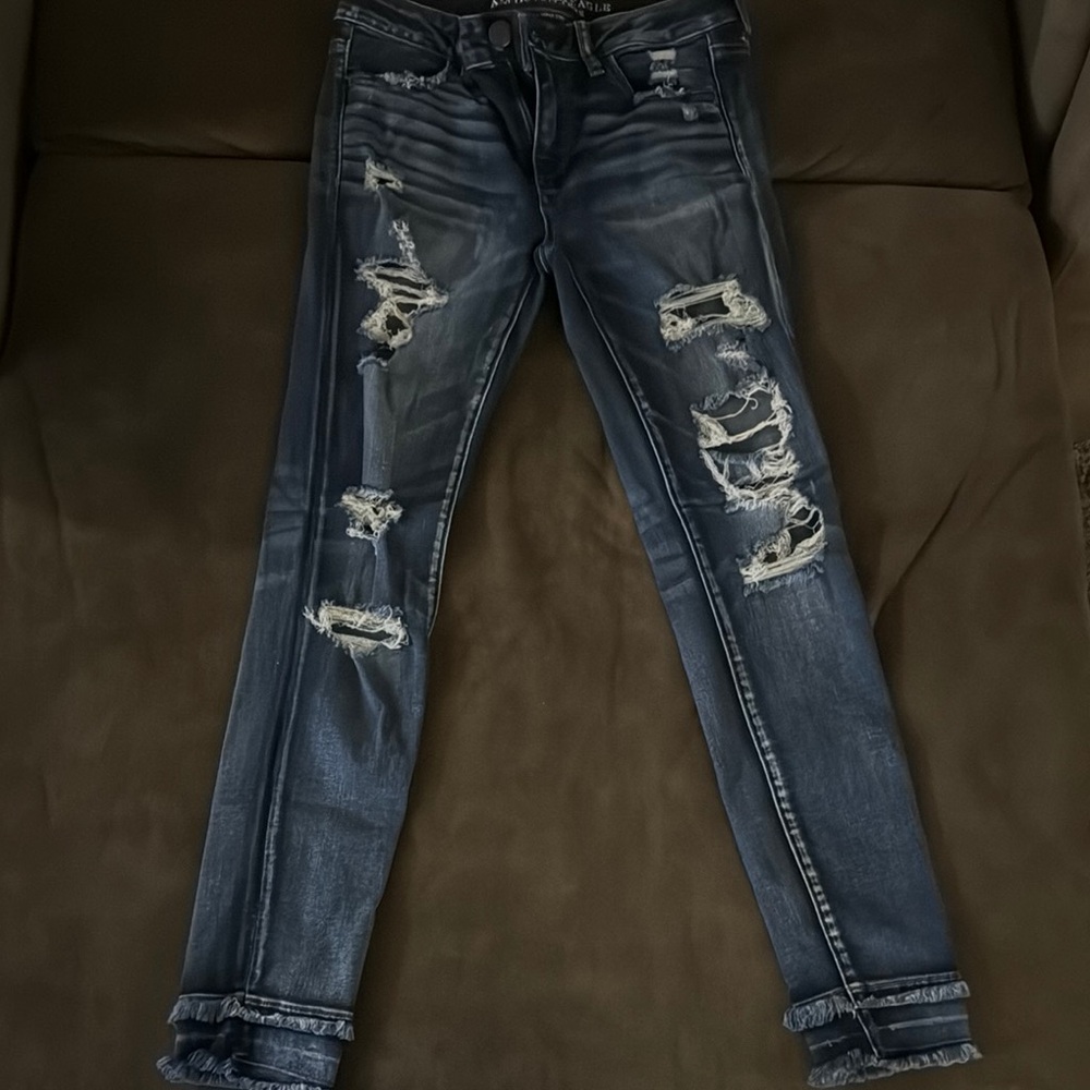 Distressed Blue Jeans